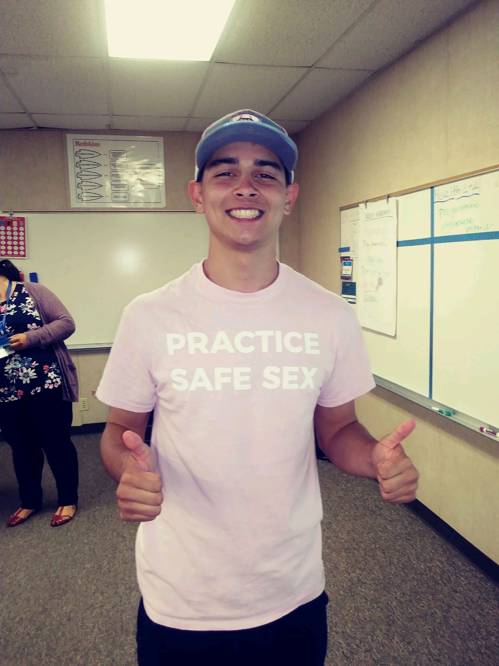 Young man in pink shirt 