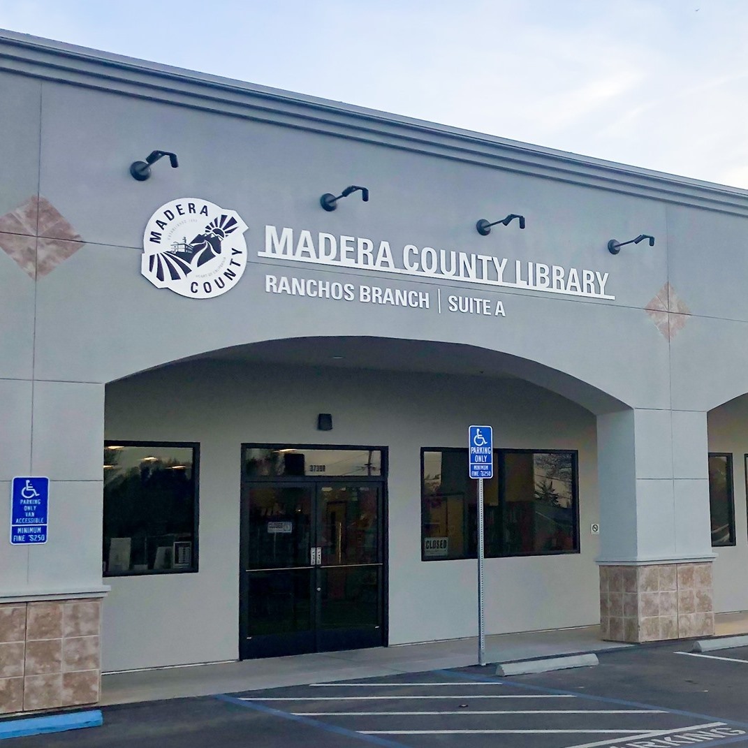 Madera Ranchos library entrance by a handicapped parking spot