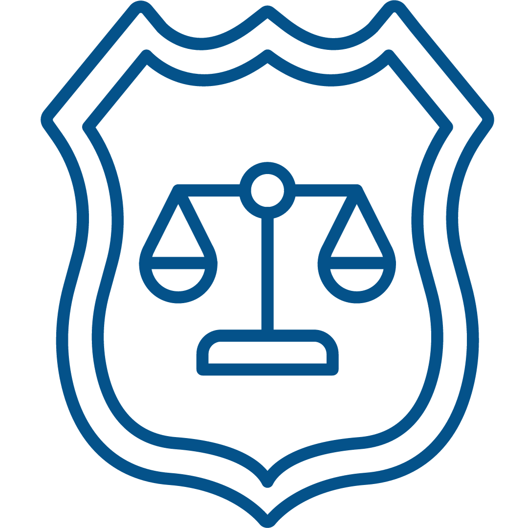 Justice Logo - blue outline of a shield with the silhouette of old fashioned scale in the middle